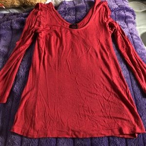 red shirt with slits in sleeves